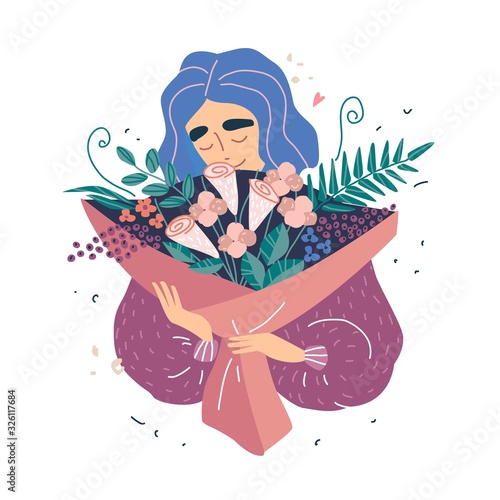 Young beautiful woman holding a bouquet of flowers