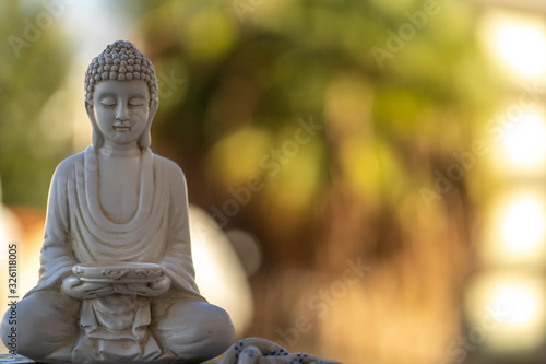 Billede på lærred buddha statue in calm rest pose