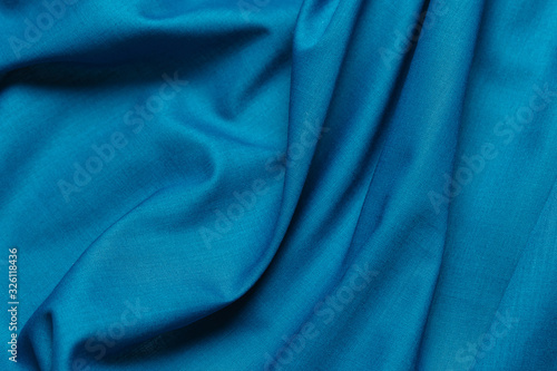 Blue fabric cloth texture. abstract texture background with soft waves.