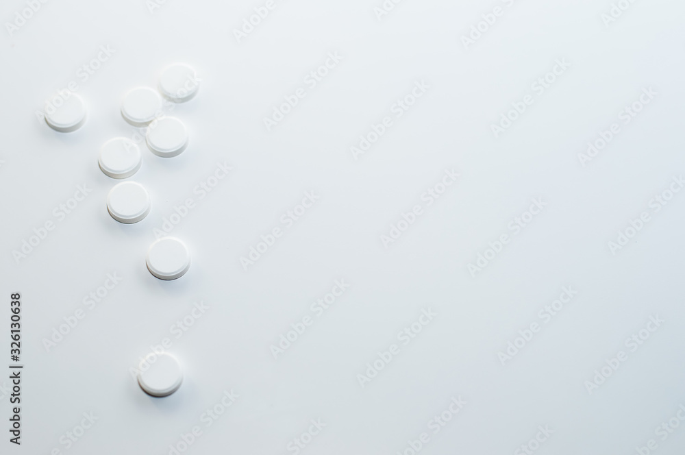 white tablets on a white background. Medicines for the disease. vitamins for health white tablets on a white background. Medicines for the disease. vitamins for health