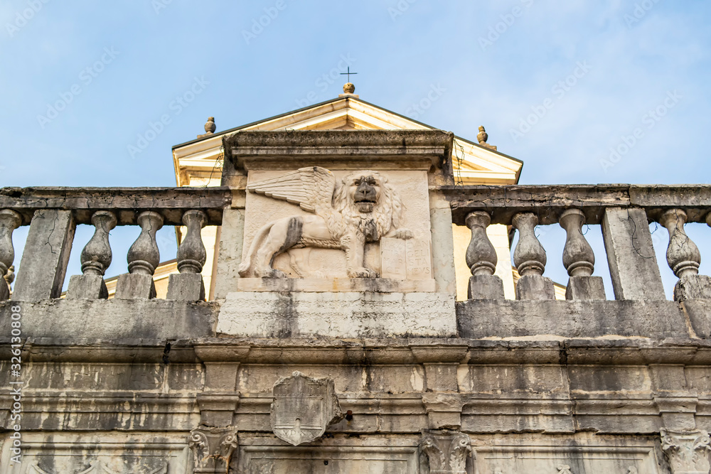 Fototapeta premium Representation of a Venetian lion in bas-relief located in Feltre, Veneto - Italy