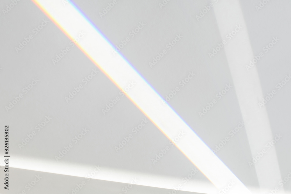 Blurred overlay effect for photo and mockups. Wall texture with organic drop diagonal shadow and rays of light from window on a white wall. Refraction optical effect. Blurred overlay effect for photo and mockups. Wall texture with organic drop diagonal shadow and rays of light from window on a white wall. Refraction optical effect.