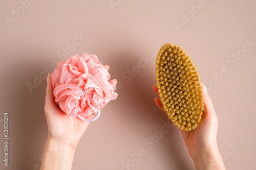 Фотография Bath shower sponge loofah vs eco-friendly natural bath massage brush comparison concept