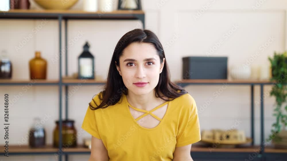 Angry girl showing fuck you and expressing negative emotions at home Angry girl showing fuck you and expressing negative emotions at home