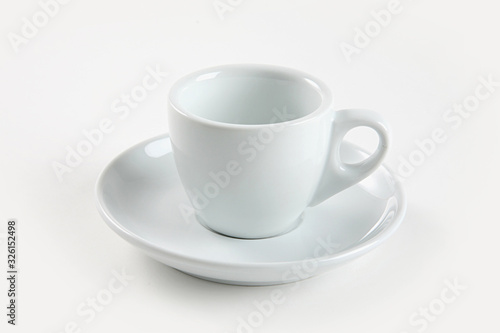 White ceramic coffee cup on white background.