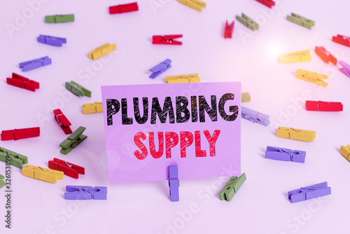 Word writing text Plumbing Supply. Business photo showcasing tubes or pipes connect plumbing fixtures and appliances Colored clothespin papers empty reminder white floor background office photo