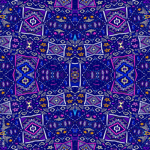 Ethnic pattern. Aztec fabric. Geometric tribal ornament. Brazilian or Mexican print. Clothes or interior design. Traditional homespun textile. Vector seamless pattern.
