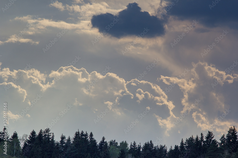 Obraz premium Dramatic cloudy sky. Fluffy clouds.