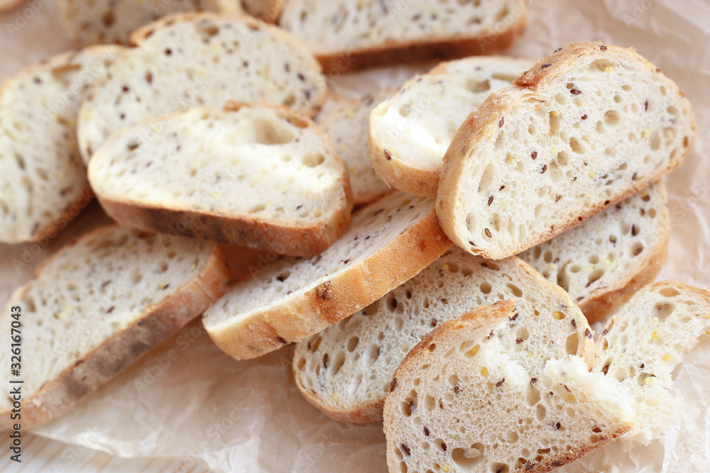 Sliced homemade bread with sesame and flax seeds Sliced homemade bread with sesame and flax seeds
