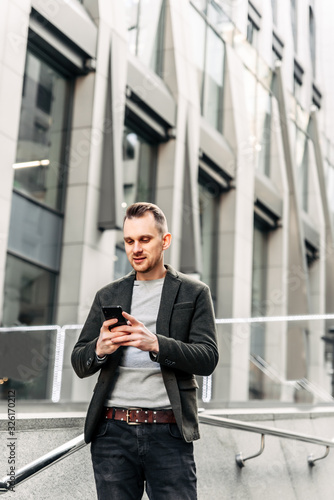 Wallpaper Mural A man in smart casual is chatting on the phone Torontodigital.ca
