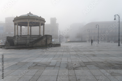 plaza del castillo pamplona con niebla photo
