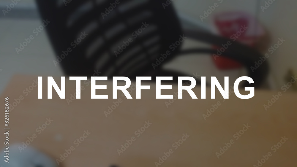 Interfering word with blurring business background Interfering word with blurring business background