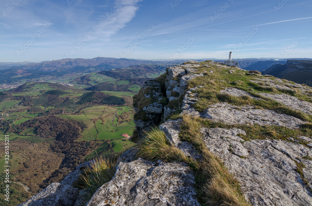 green valley from the rocky summit of the mount horizontal green valley from the rocky summit of the mount horizontal