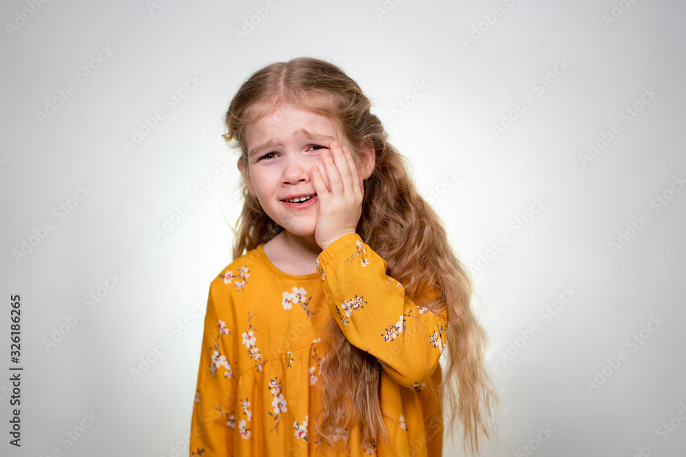 Strong Toothache little girl with long blonde hair Strong Toothache little girl with long blonde hair