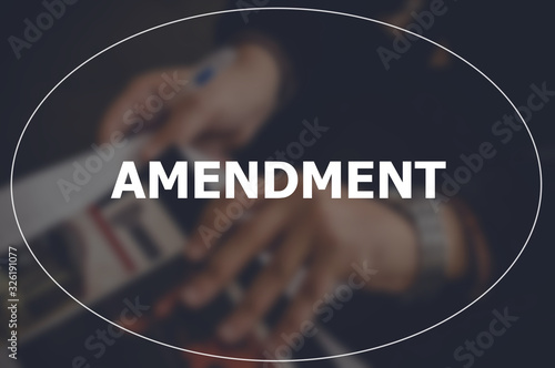 Amendment word with blurring business background