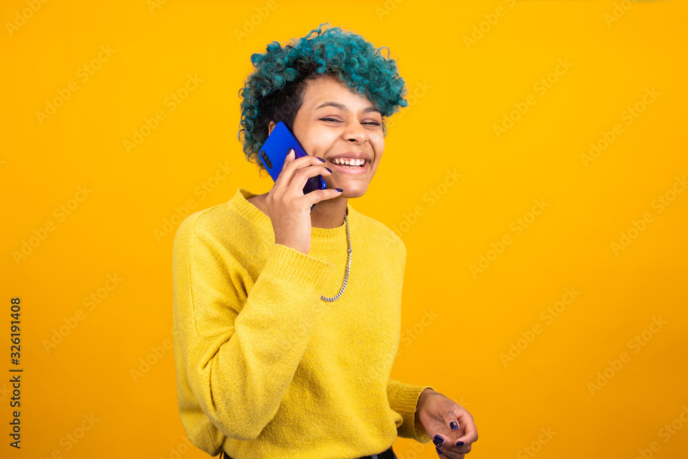 Young woman or girl with smart phone isolated on color background Young woman or girl with smart phone isolated on color background