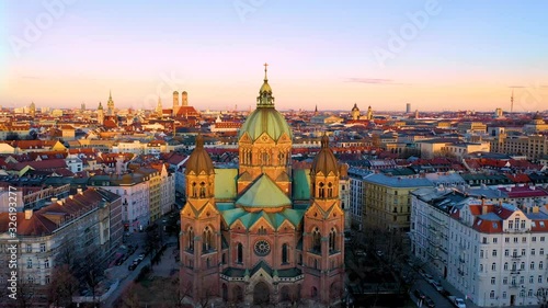 Aerial Munich skyline view from above, drone viewo fly over old town marienplatz town hall and most popular church in munchen germany.
