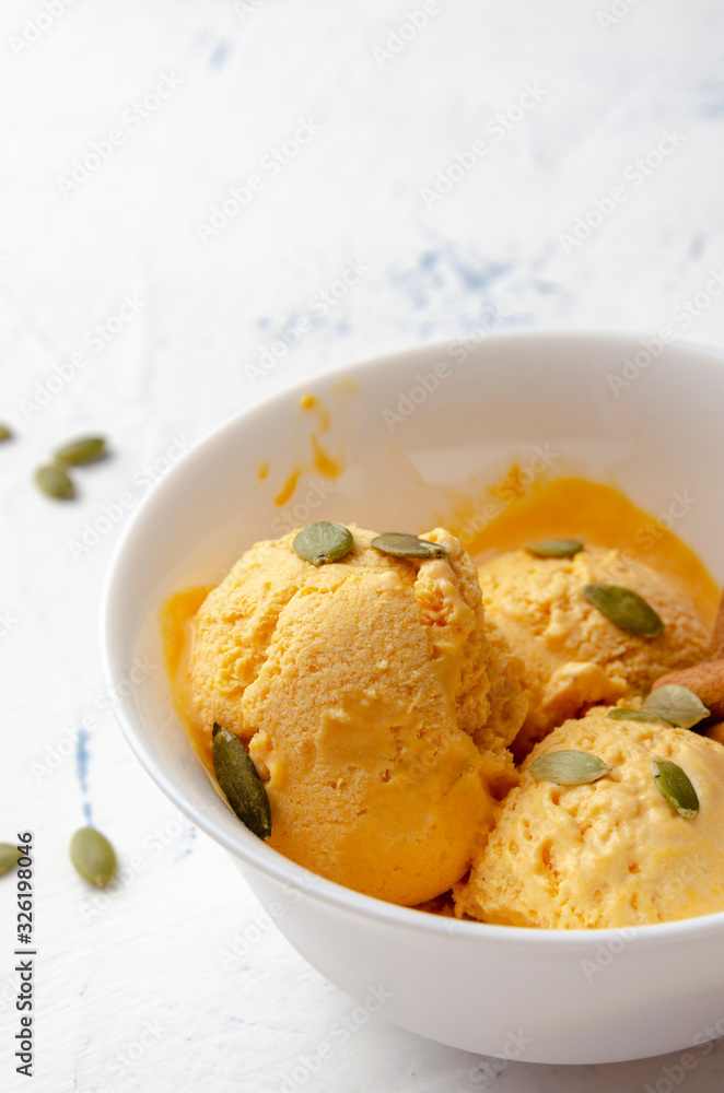 homemade pumpkin ice cream with cinnamon and seeds homemade pumpkin ice cream with cinnamon and seeds