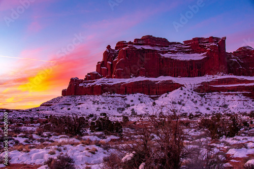 The Sunrise Illuminates The Clouds In Arches National Park