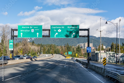 Vancouver, British Columbia, Canada - December, 2019 - Beautiful view of the Vancouver streets with traffic sings to Marine Dr, Whistler and Capilano Rd.