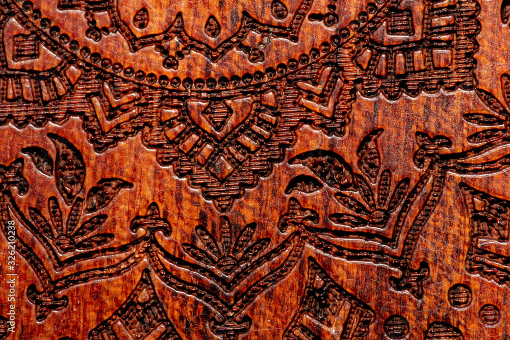 Wooden carving with different drawings for a mobile phone case