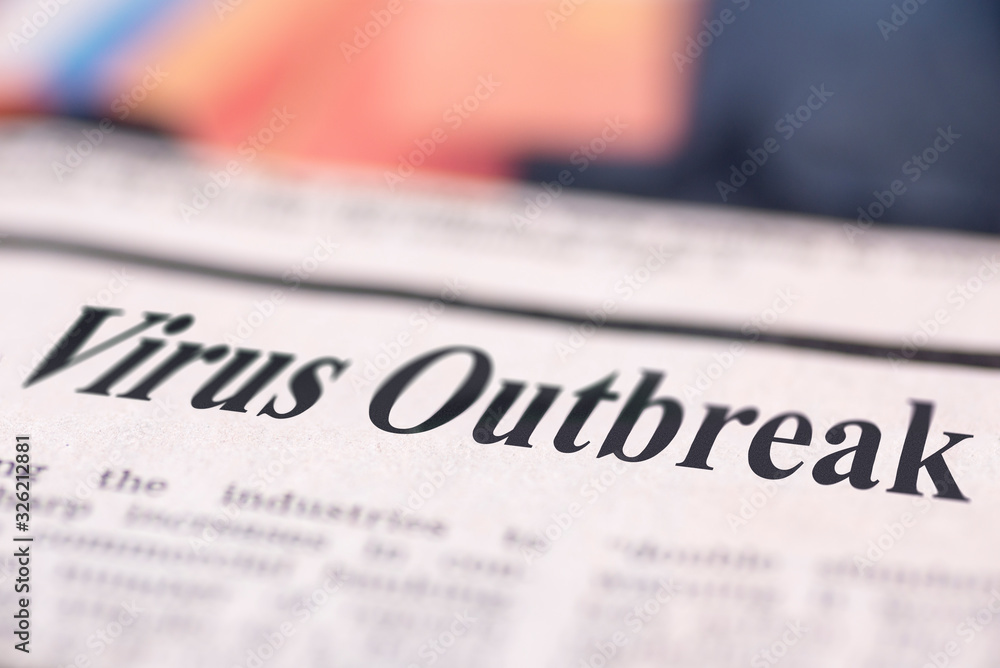 Obraz premium Virus Outbreak written newspaper