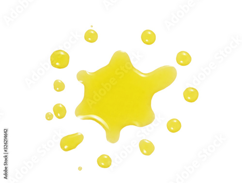 Oil drop splatter isolated on white background. Cosmetic essential oil or food ingredient yellow liquid sample macro top view