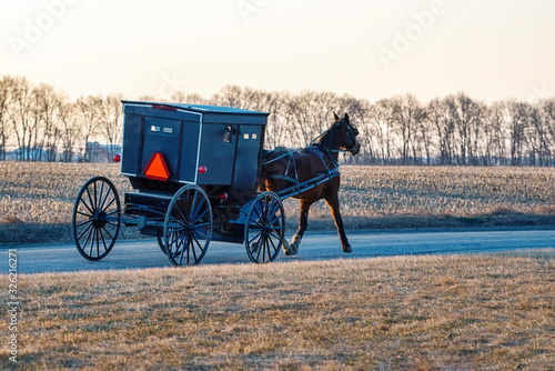 Amish Buggy on Rural Road in Winter © David Arment
