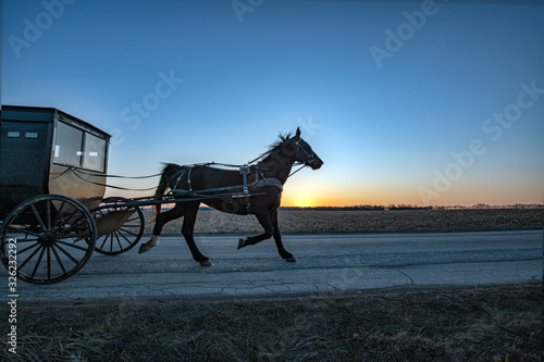 Amish Horse and Buggy at Sunrise