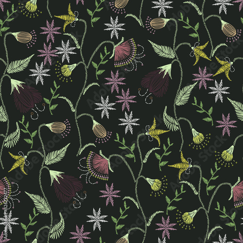 Floral embroidery seamless pattern. Sketch hand drawn botanical motifs. Doodle line, dash garden flowers, leaves, branches. Colorful vector texture for fashion, fabric, wallpaper, print. Retro style