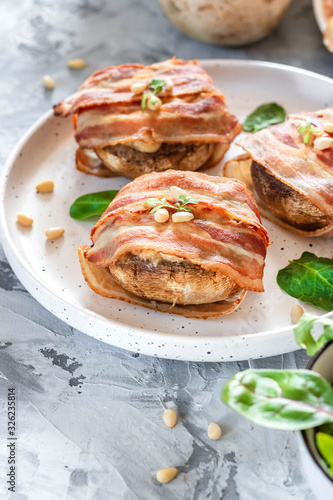 Baked mushrooms stuffed with cheese and pine nuts