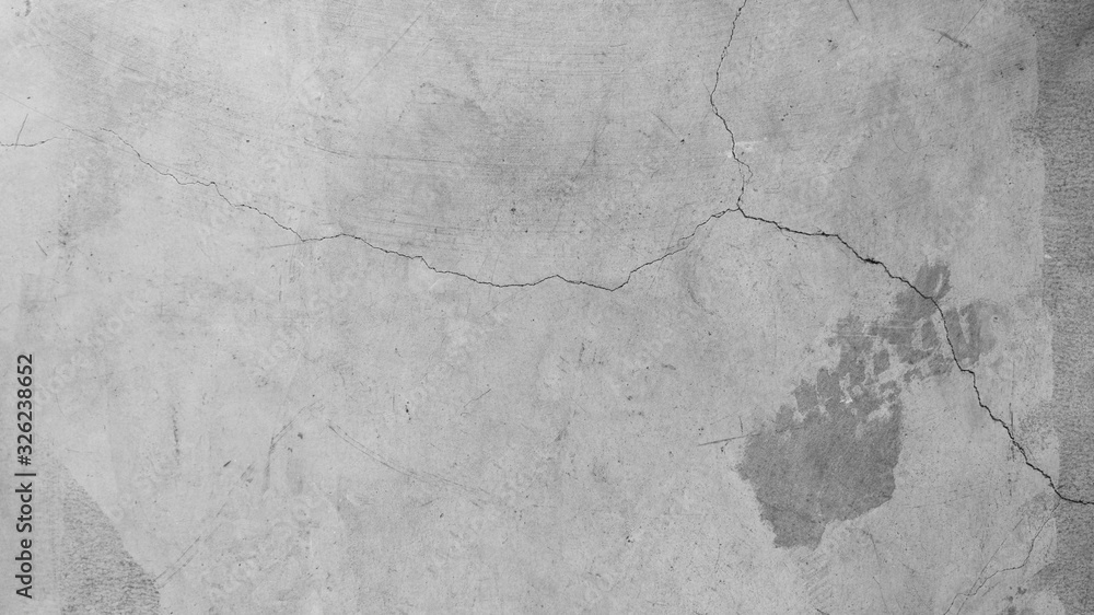 Naklejka premium Abstract textured cement concrete gray background and wallpaper. Cracks are rugged, vintage is suitable for doing folk.