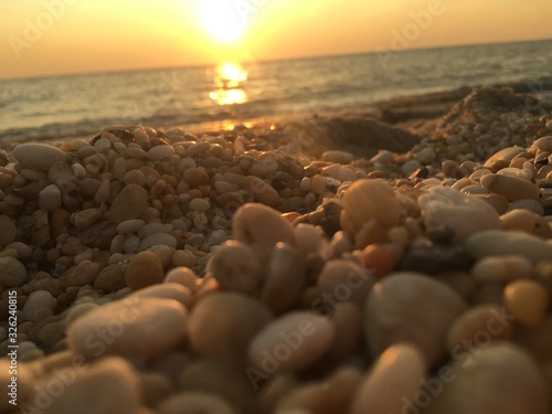 sunset on the beach © Claudia