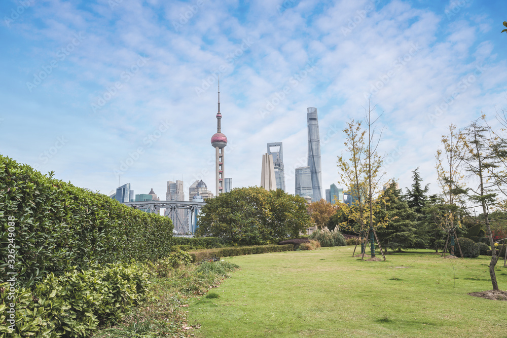 the park and skyline of shanghai in china.
