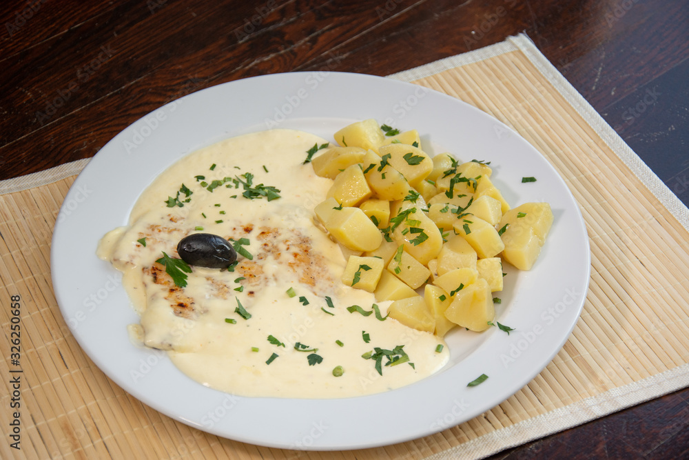 Chicken breast with cream sauce and nature potatoes Chicken breast with cream sauce and nature potatoes