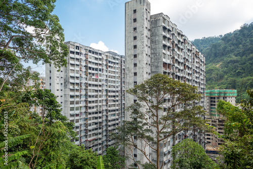 Huge apartment complex in the Paya Terubong, a suburb of George Town on the island of Penang. The complex comprises 2115 units housed within 9 blocks of 23 stories each photo