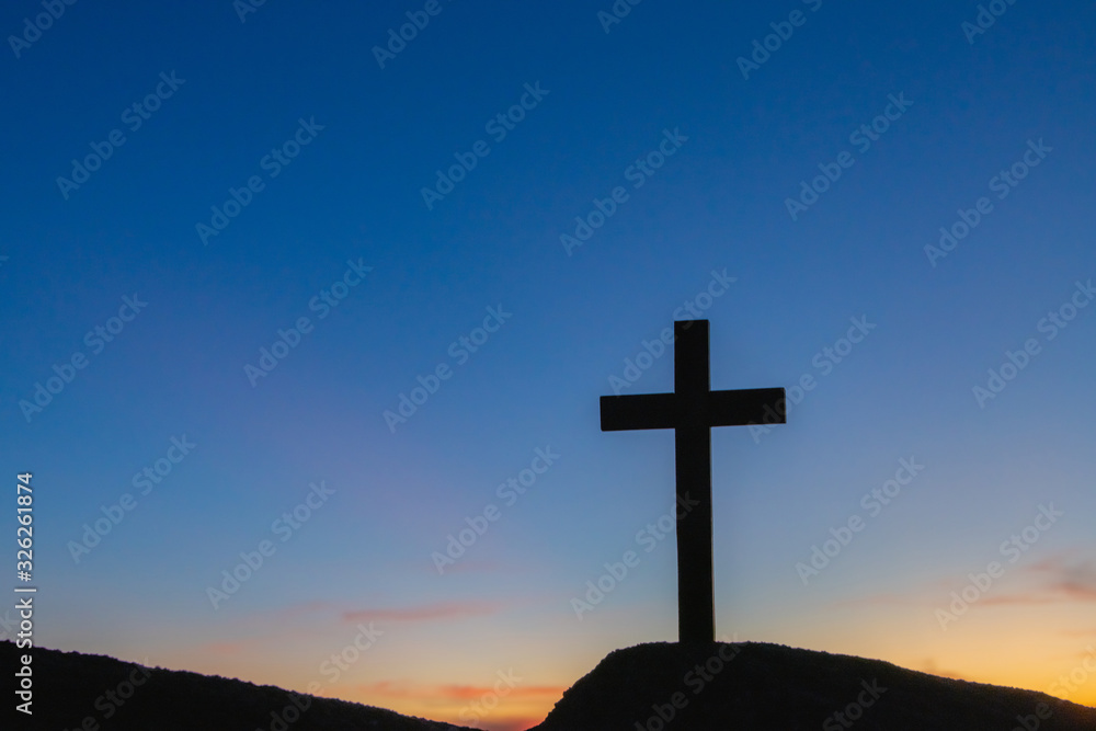 The silhouette of the crucifixion of Jesus Christ - crossing at sunset The silhouette of the crucifixion of Jesus Christ - crossing at sunset