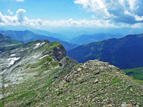 View of the Ratikon border alpine mountain massif or Rätikon Grenzmassiv (oder Raetikon) from Liechtenstein Alps - Steg, Liechtenstein photo