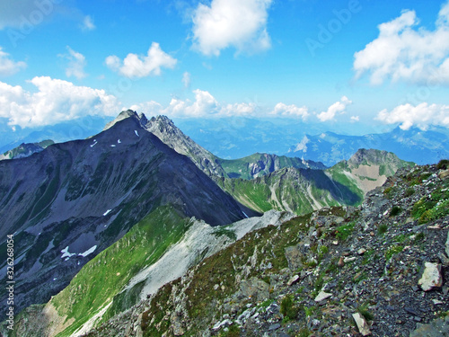 View of the Ratikon border alpine mountain massif or Rätikon Grenzmassiv (oder Raetikon) from Liechtenstein Alps - Steg, Liechtenstein photo