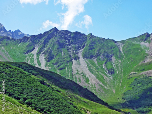 View of the Ratikon border alpine mountain massif or Rätikon Grenzmassiv (oder Raetikon) from Liechtenstein Alps - Steg, Liechtenstein photo