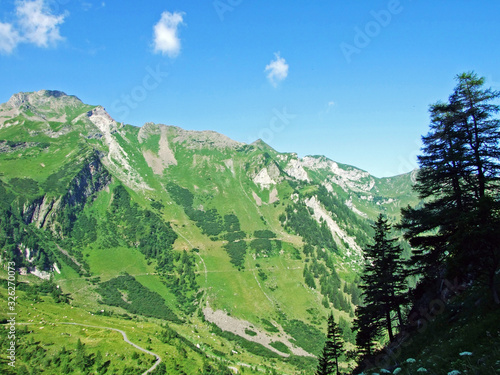 View of the picturesque peaks of the Liechtenstein Alps mountain massif from the Naaftal alpine valley - Steg, Liechtenstein photo