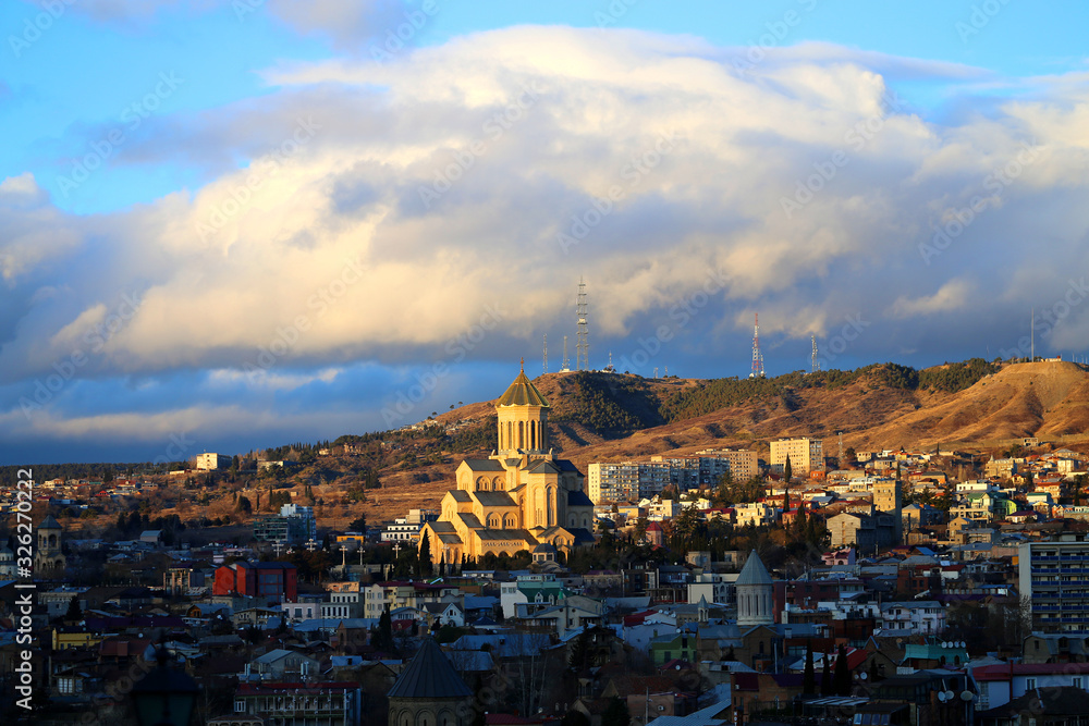Photo of a beautiful sunset over the city of Tbilisi