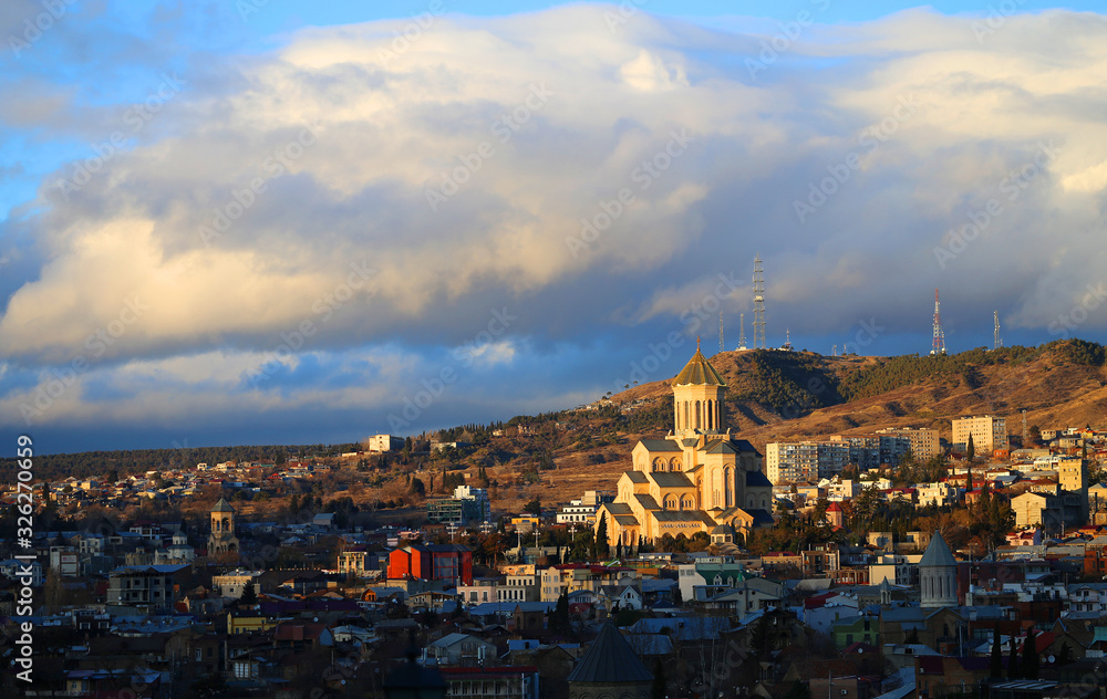 Photo of a beautiful sunset over the city of Tbilisi