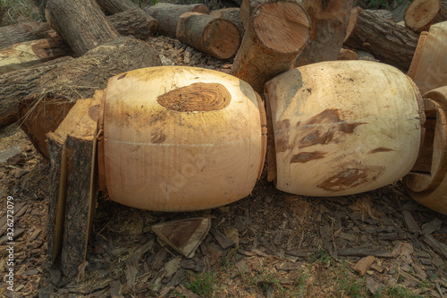 .Making a drum using wood forming various shapes Then stretched the animal skin to be taut photo