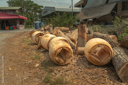 .Making a drum using wood forming various shapes Then stretched the animal skin to be taut photo