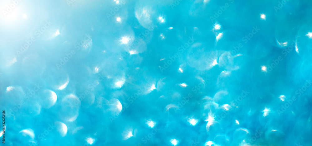 Abstract bokeh background. Blue bokeh lights. Blurred texture. Abstract bokeh background. Blue bokeh lights. Blurred texture.