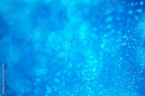  Abstract bokeh background. Blue bokeh lights. Blurred texture.