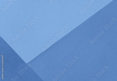 Flat lay background with blue papers
