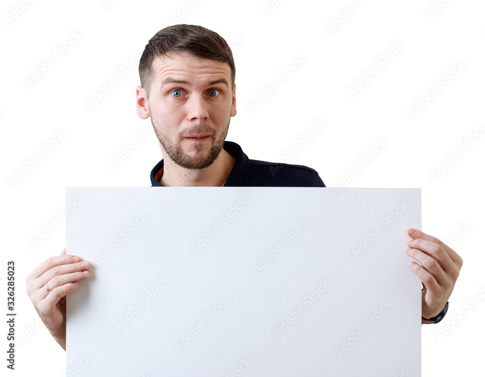 Surprised businessman holds a blank white sheet for text space. Surprised businessman holds a blank white sheet for text space.