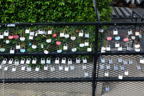 Selective  focus of love padlock at the roadside at Setia Alam. photo